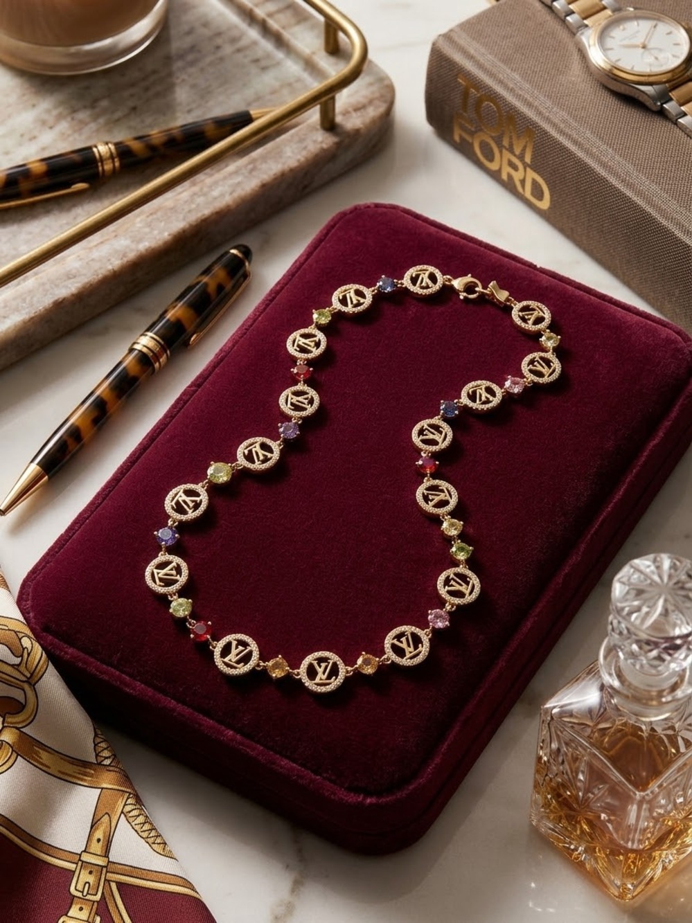 Louis Vuitton style necklace. Multicolored gemstone colors with logo.